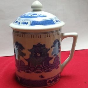 Vintage ceramic chinese tea mug.
